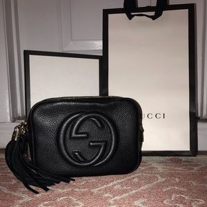 Black leather Gucci disco bag with gold hardware